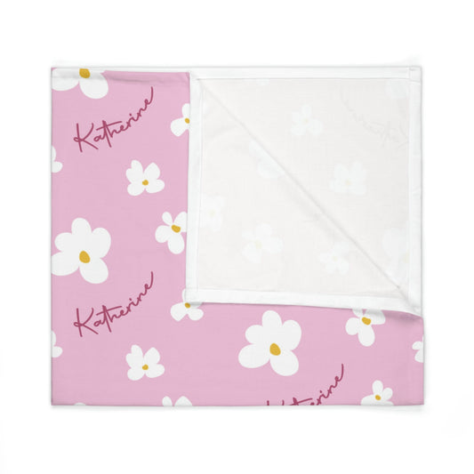 Folded jersey fabric personalized baby blanket in pink daisy pattern