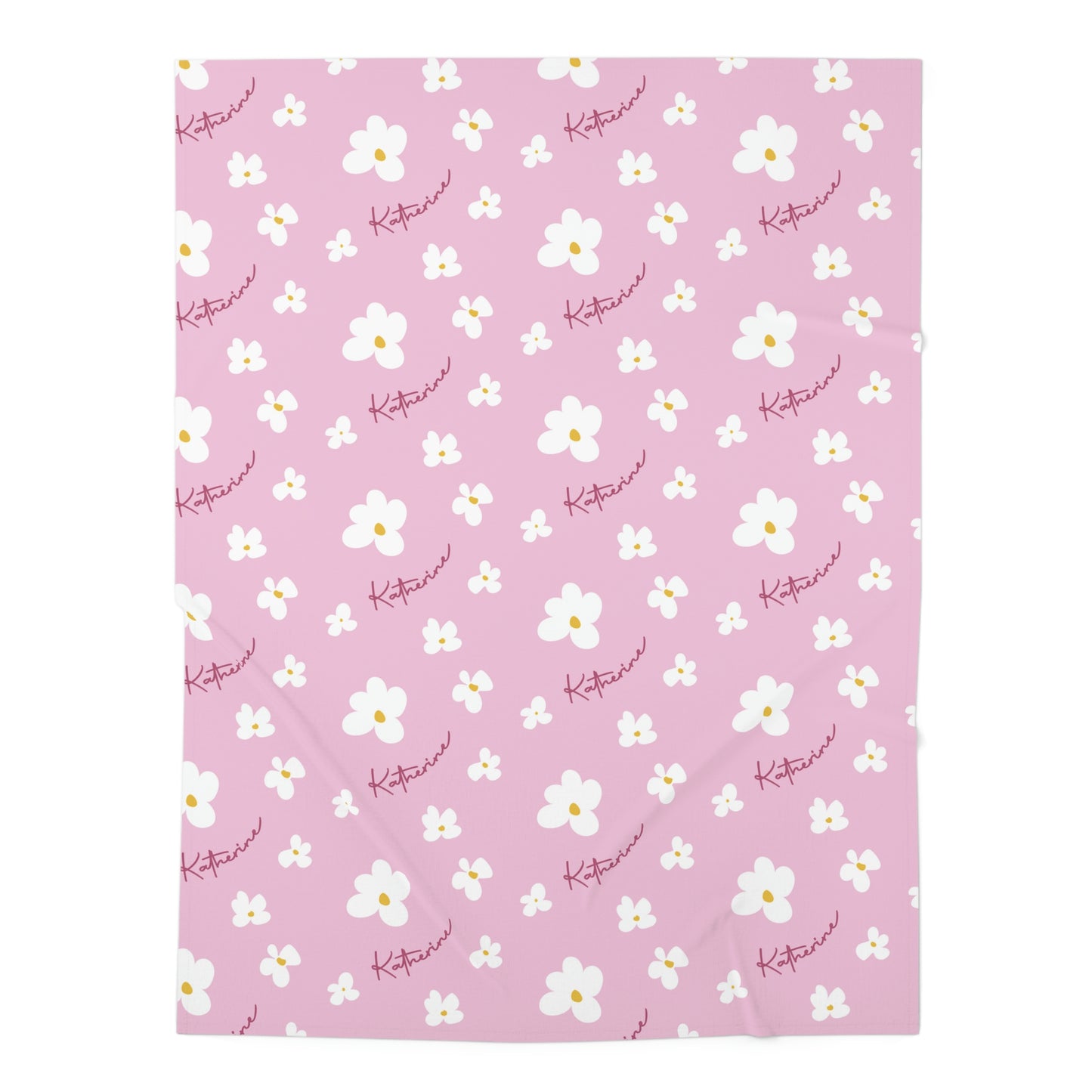 Jersey personalized baby blanket in pink daisy pattern laid flat