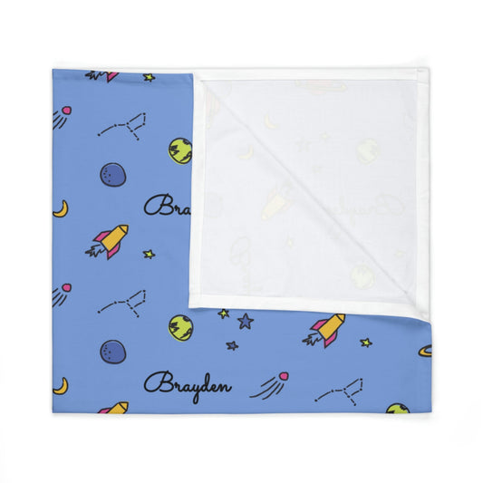 Folded jersey fabric personalized baby blanket in space, rocket and stars pattern
