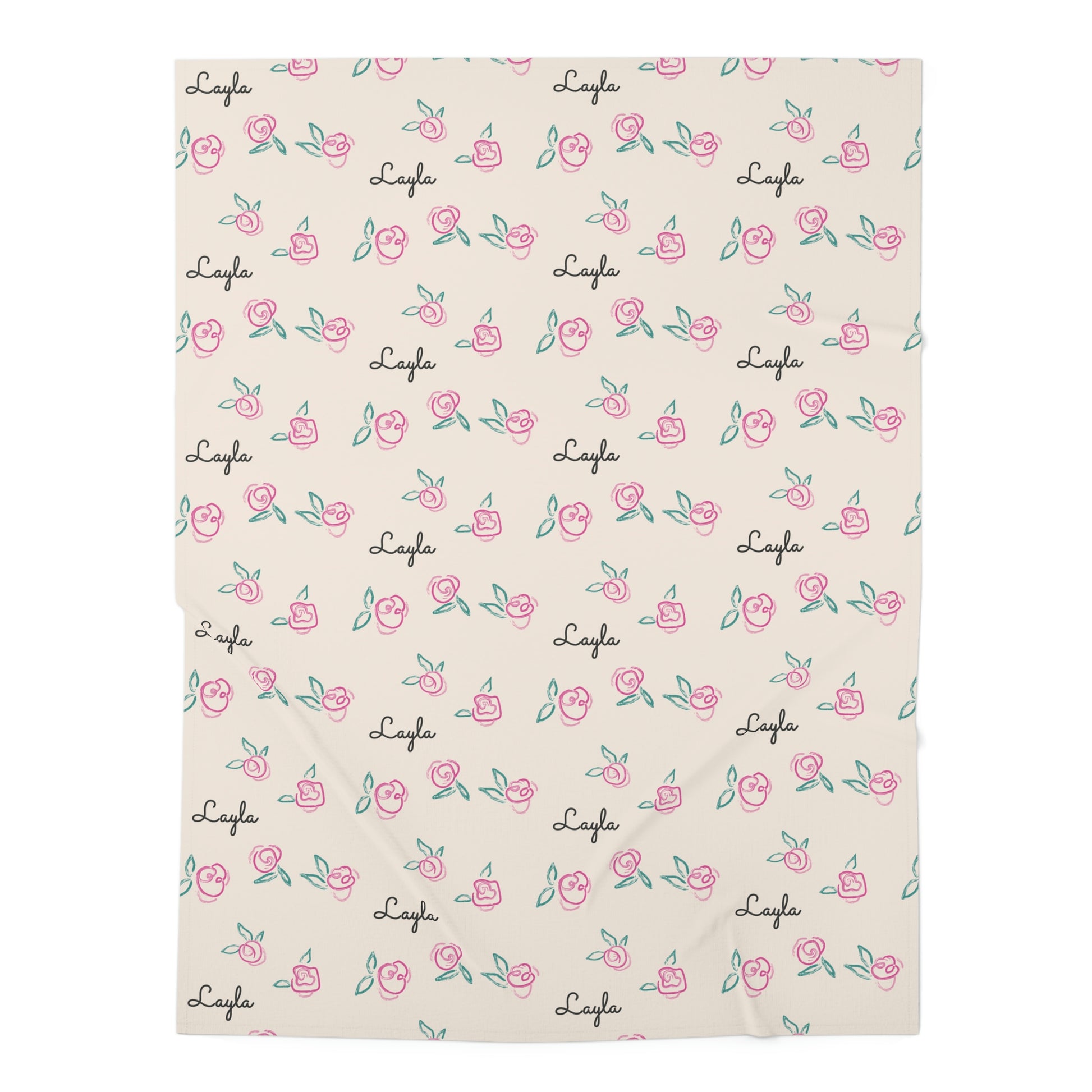 Jersey personalized baby blanket in pink rose with green leaves pattern laid flat