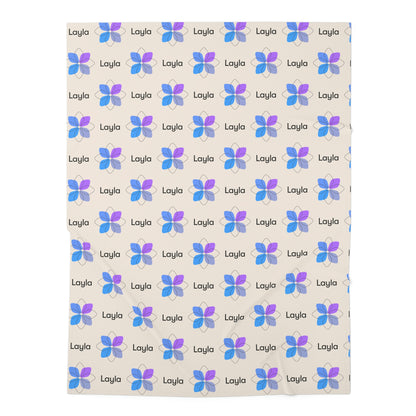 Jersey personalized baby blanket in blue boho geometric flower pattern laid flat