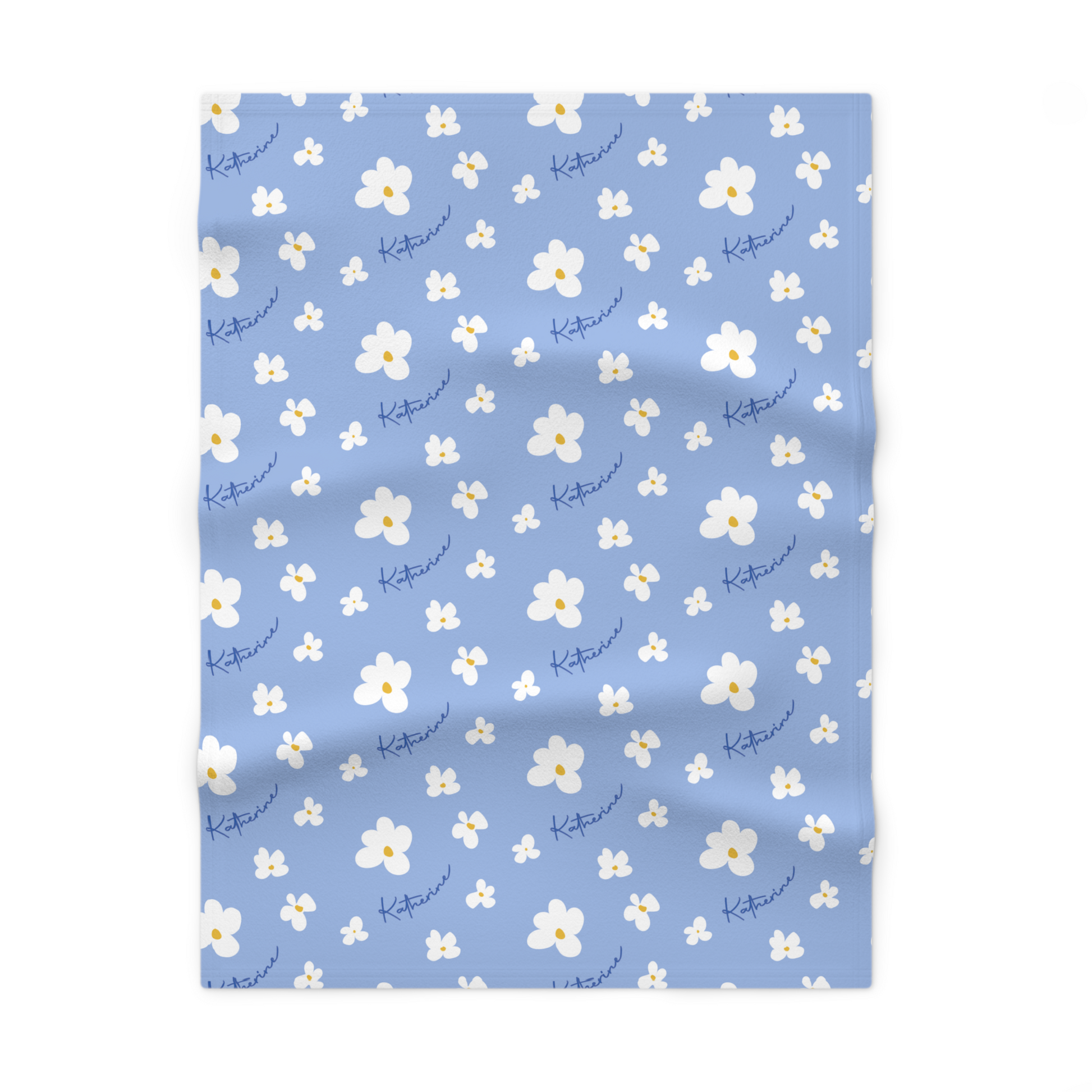 Fleece personalized baby blanket in blue daisy pattern laid flat