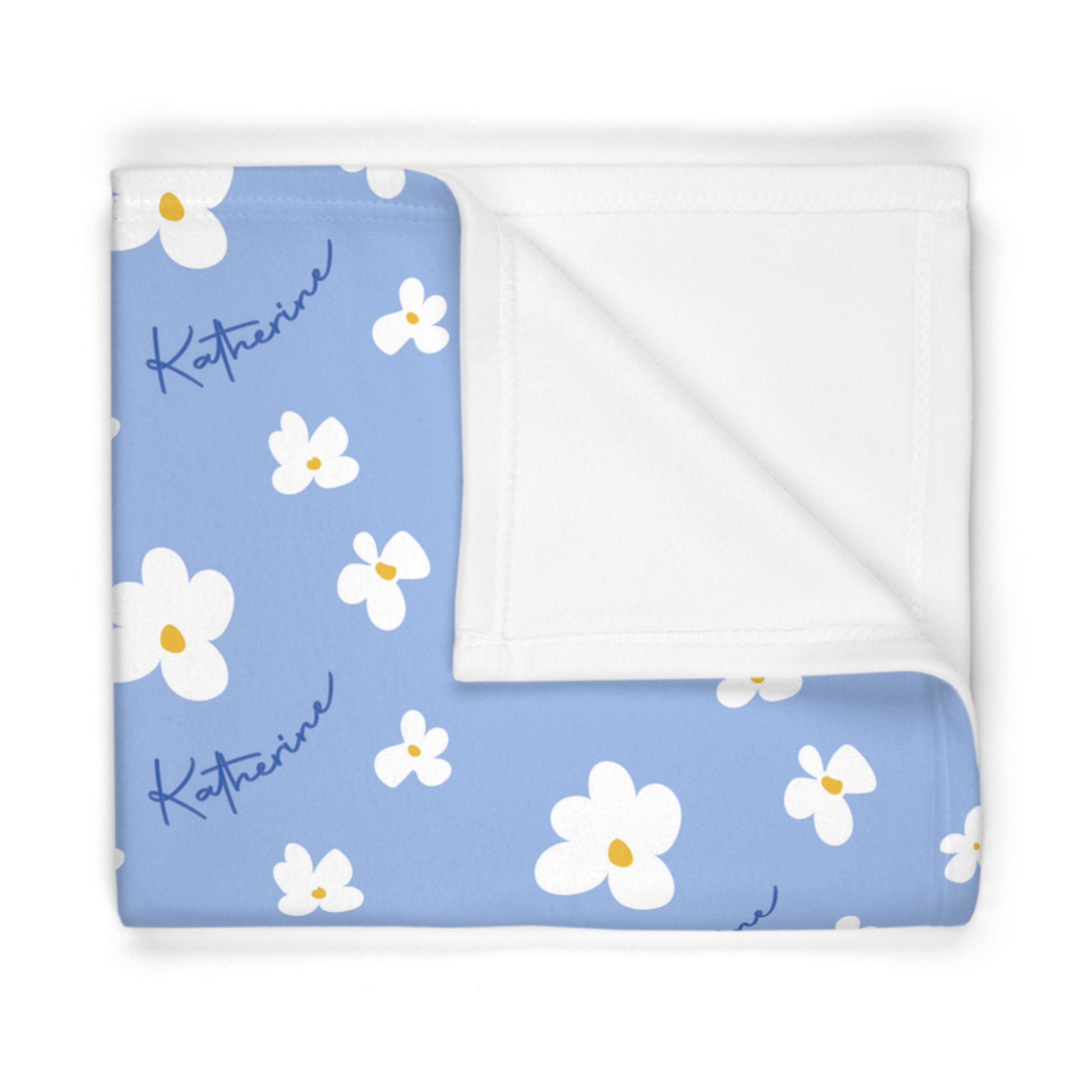Folded fleece fabric personalized baby blanket in blue daisy pattern