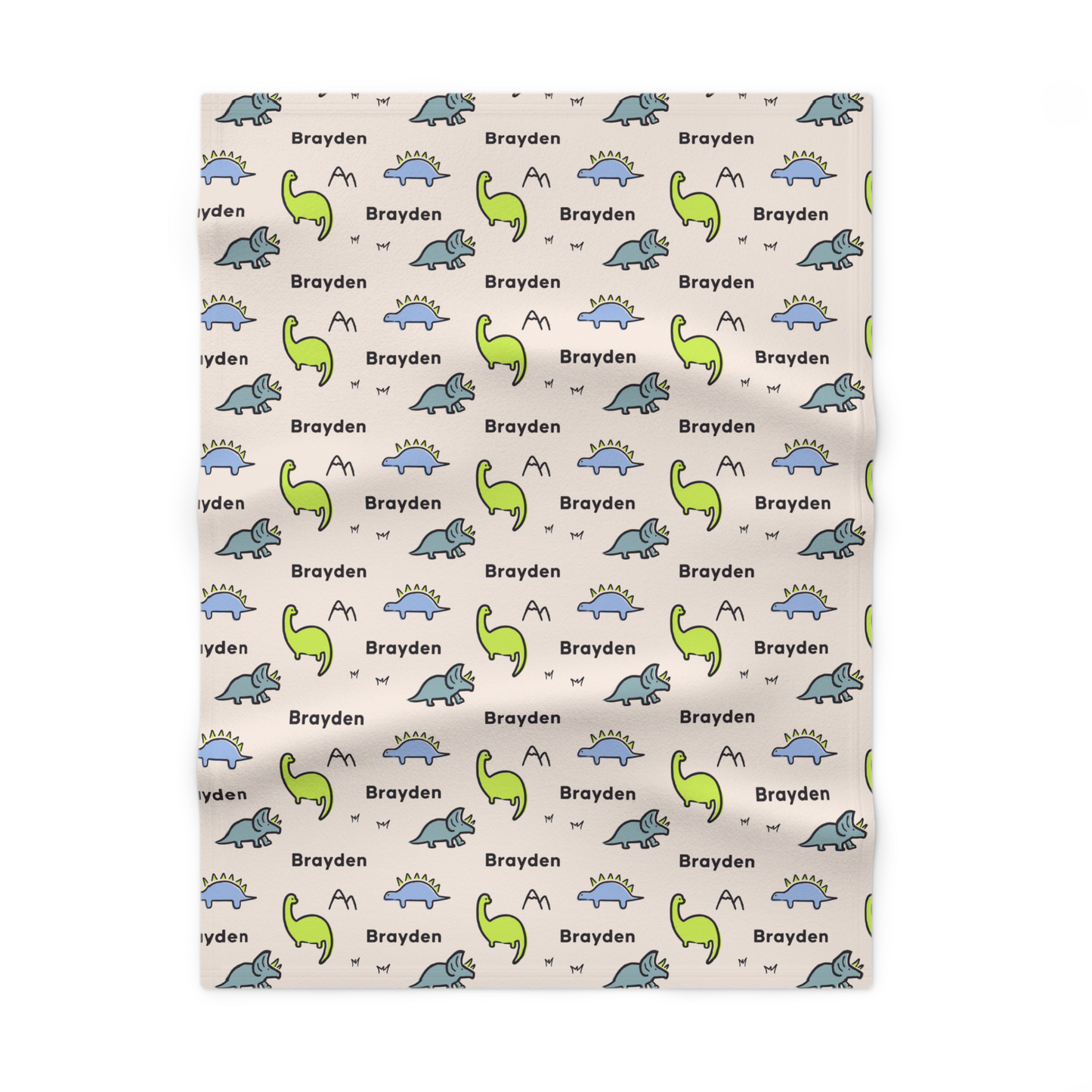 Fleece personalized baby blanket in dinosaur pattern laid flat