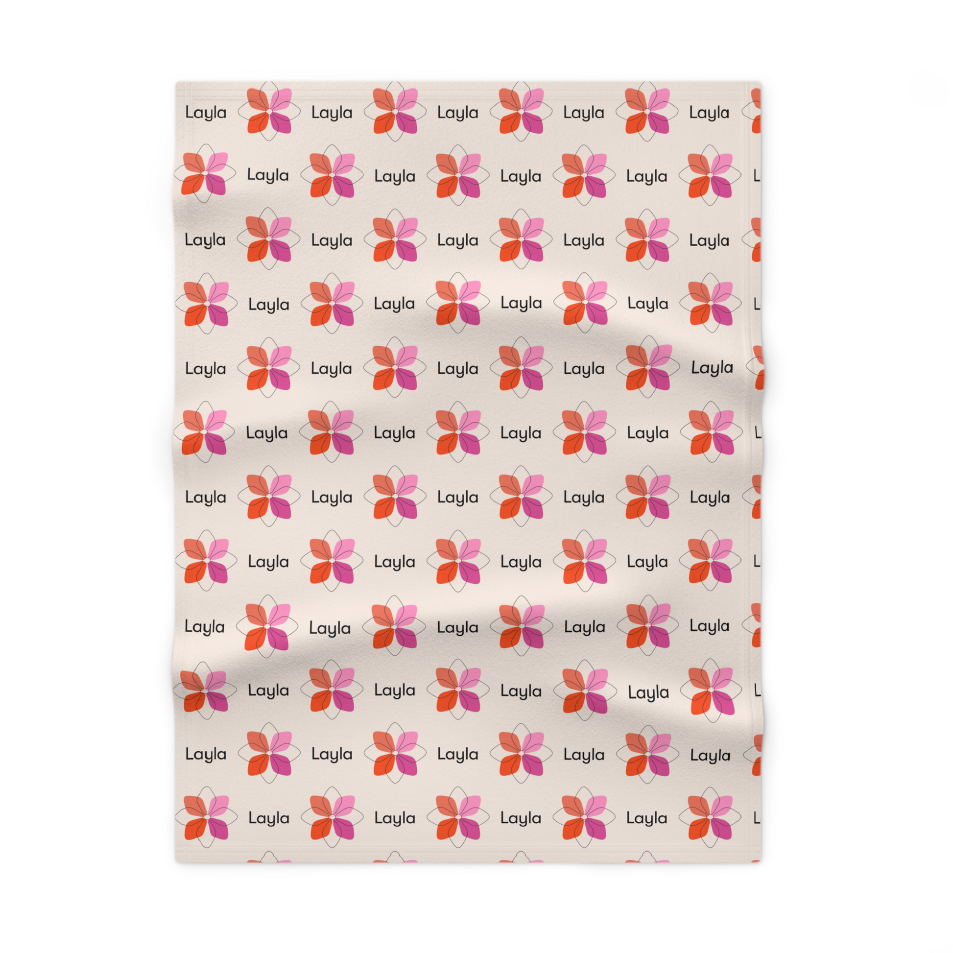 Fleece personalized baby blanket in pink geometric boho flower pattern laid flat