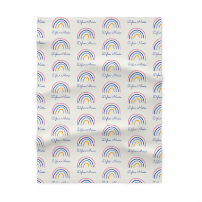Fleece personalized baby blanket in rainbow pattern laid flat