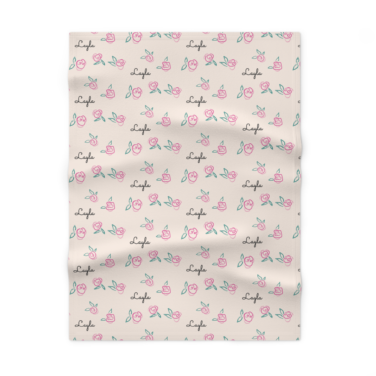 Fleece personalized baby blanket in pink rose with green leaves pattern laid flat