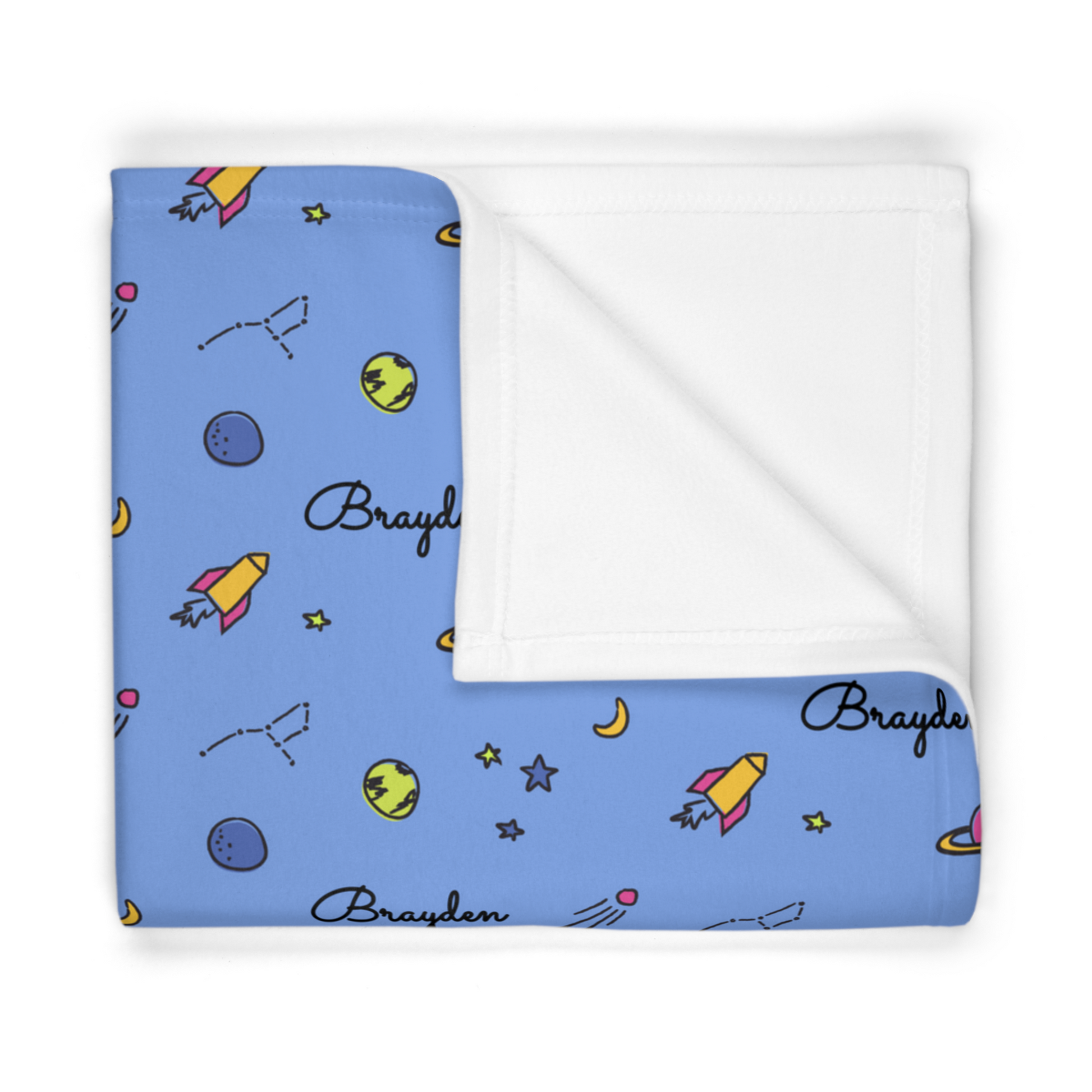 Folded fleece fabric personalized baby blanket in space, rocket and stars pattern