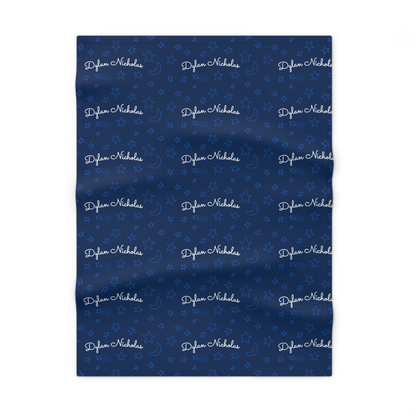 Fleece personalized baby blanket in stars and moon pattern laid flat