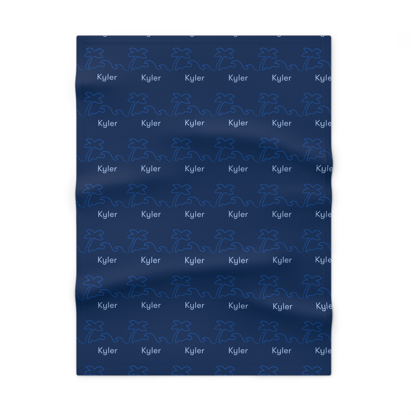 Fleece personalized baby blanket in surf and palm tree pattern laid flat