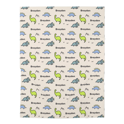 Jersey personalized baby blanket in dinosaur pattern laid flat