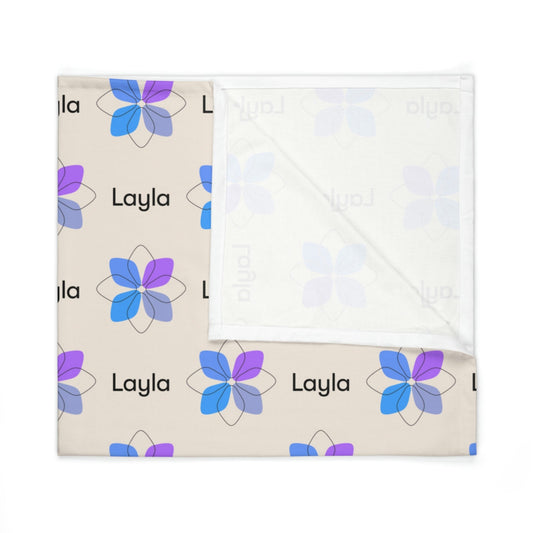 Folded jersey fabric personalized baby blanket in blue boho geometric flower pattern