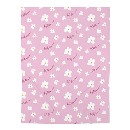 Jersey personalized baby blanket in pink daisy pattern laid flat