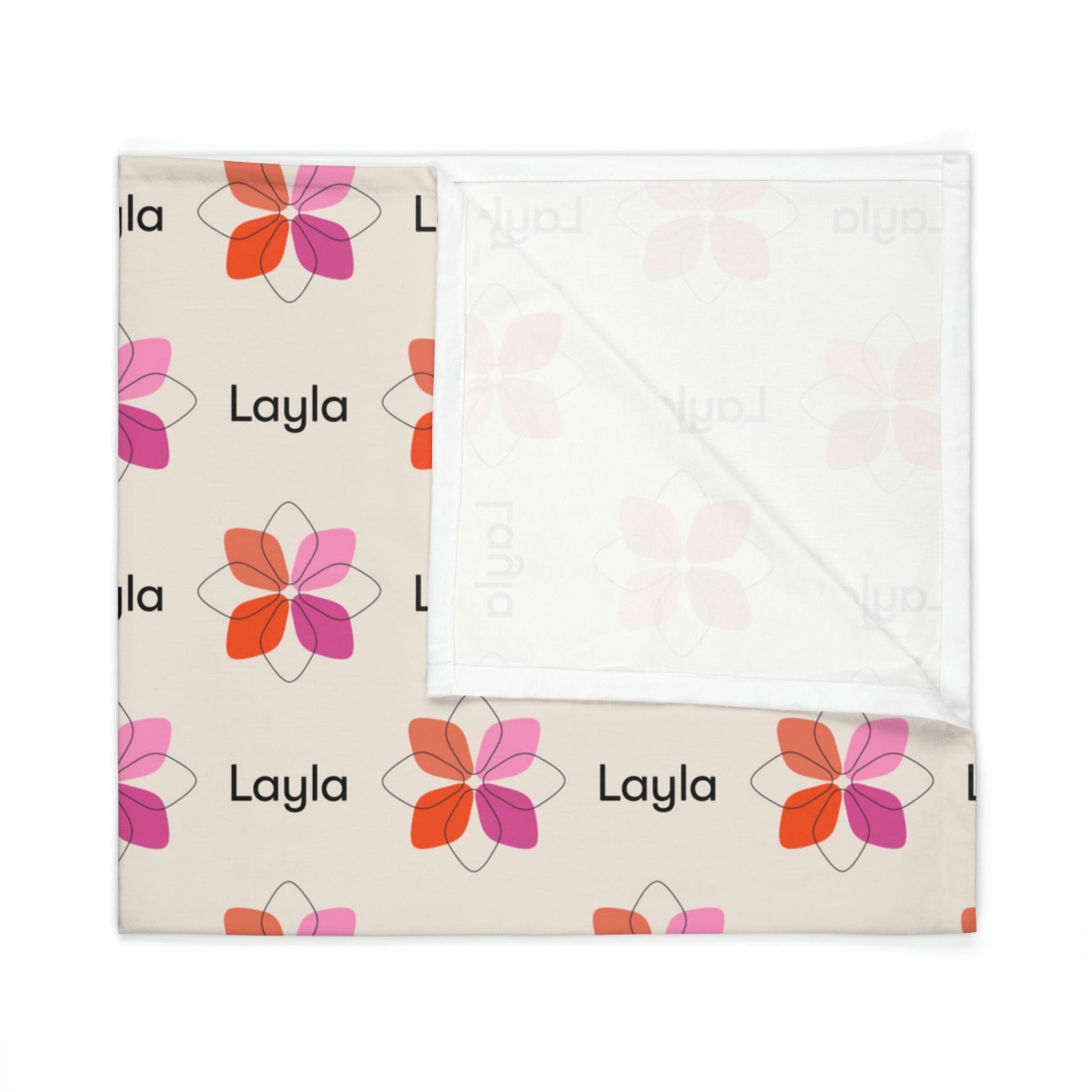 Folded jersey fabric personalized baby blanket in pink boho geometric flowerpattern