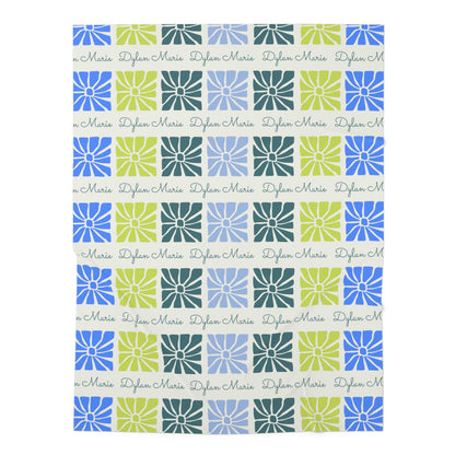 Jersey personalized baby blanket in boho blue flower pattern laid flat