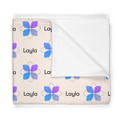 Folded fleece fabric personalized baby blanket in blue boho geometric flower pattern